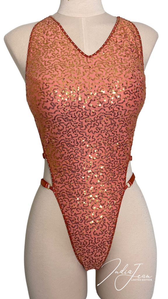 Front picture of golden coral leotard on mannequin